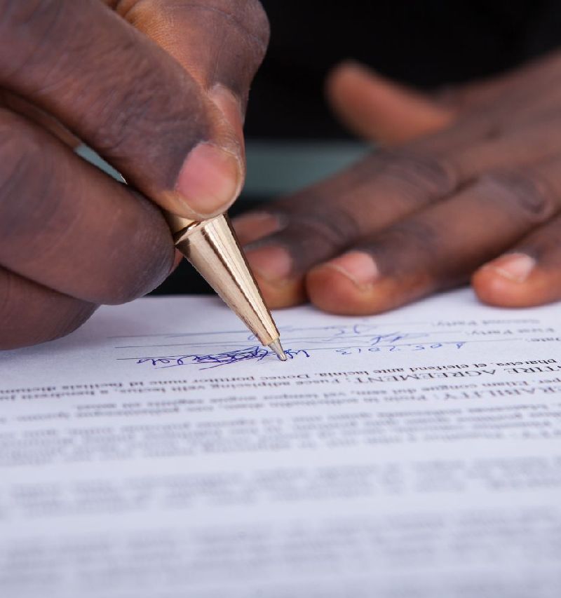 Man signing contract
